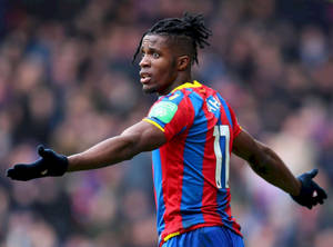 Wilfried Zaha Wearing Gloves Wallpaper