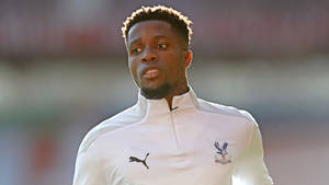 Wilfried Zaha Wearing White Wallpaper