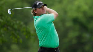William Mcgirt Swinging His Golf Club Wallpaper