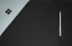 Windows 7 Laptop And Pen Wallpaper