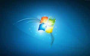 Windows 7 Logo On A Blue Background Wallpaper