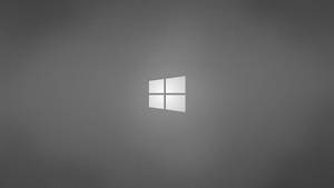 Windows Logo Against Solid Grey Background Wallpaper