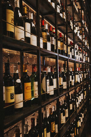 Wine Bottles On Rack Wallpaper