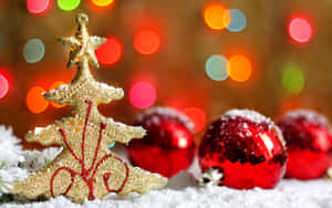 Winter Holiday Desktop With Red And Gold Christmas Ornaments Wallpaper