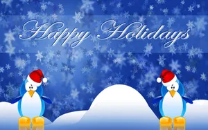 Winter Holiday Desktop With Two Blue Penguins Wallpaper