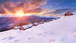 Winter Houses In Sunrise Wallpaper