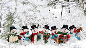 Winter Season Snowmen Wallpaper