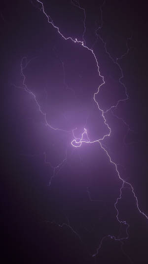 Witness The Beauty Of A Striking Lightning Bolt Wallpaper