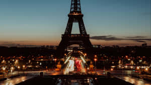 Witness The Beauty Of Paris By Night. Wallpaper
