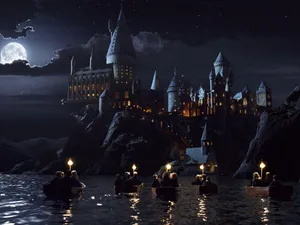 Wizards Rowing To Hogwarts Harry Potter Ipad Wallpaper