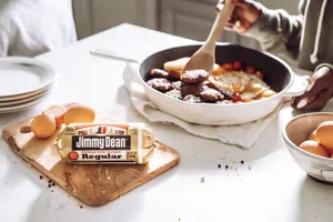 Woman Cooking Breakfast Wallpaper