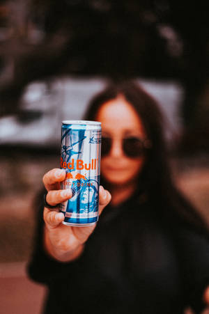Woman Holding Red Bull Wallpaper