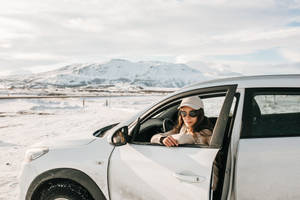 Woman In Car During Cool Winter Wallpaper