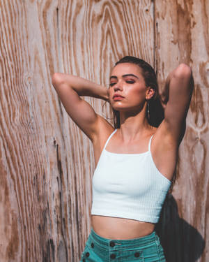 Woman Posing Flex Biceps Wallpaper