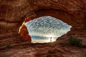 Woman Posing In An Arch Wallpaper