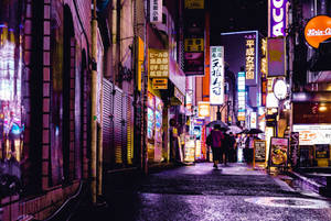 Woman Walking Night City Wallpaper