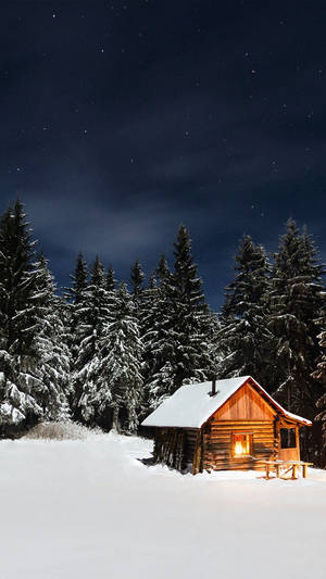 Wooden Winter House By The Forest Wallpaper