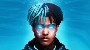 Xxxtentacion With His Iconic Blue Hair Wallpaper