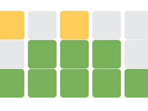 Yellow And Green Wordle Tiles Wallpaper