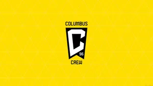 Yellow Background The Logo Of Columbus Crew Wallpaper