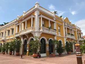 Yellow Building Exterior In Cartagena Wallpaper
