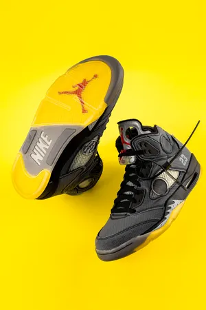 Yellow Jordan Sneakers Make A Bold Statement Wallpaper