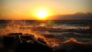 Yellow Ocean Sunset And Waves Wallpaper
