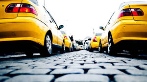 Yellow Taxi Low Angle Wallpaper