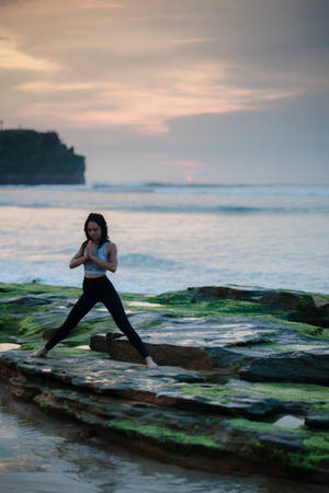 Yoga By The Beach For Mental Health Wallpaper