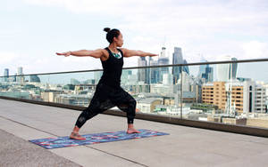 Yoga With City View Wallpaper