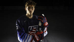 Young American Hockey Star, Jack Hughes In Action Wallpaper