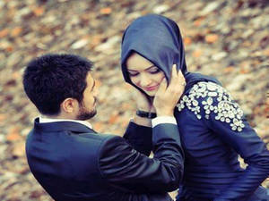 Young And Happy Muslim Couple Wallpaper