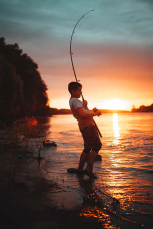 Young Boy Fishing Phone Theme Wallpaper