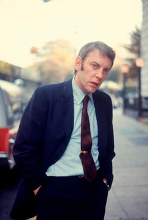 Young Donald Sutherland Street Portrait Wallpaper