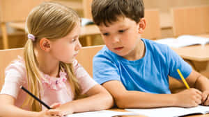 Young Students Studying Together.jpg Wallpaper