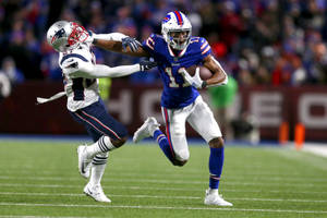 Zay Jones Pushing Off Patriots Player Wallpaper