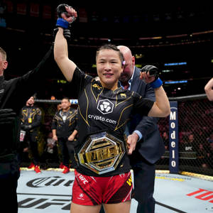 Zhang Weili With Winning Belt Wallpaper