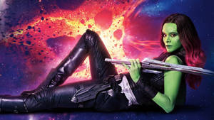 Zoe Saldana As Gamora With Sword Wallpaper
